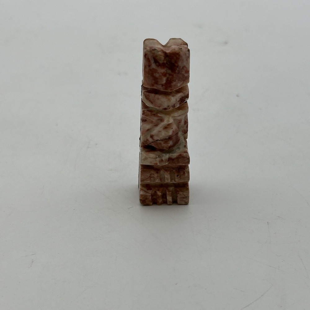 vintage hand-carved stone figurine, likely a replacement chess piece